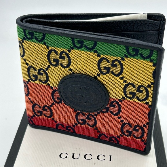 Gucci Handbags - Gucci multicolor canvas/leather  bifold wallet, made in Italy